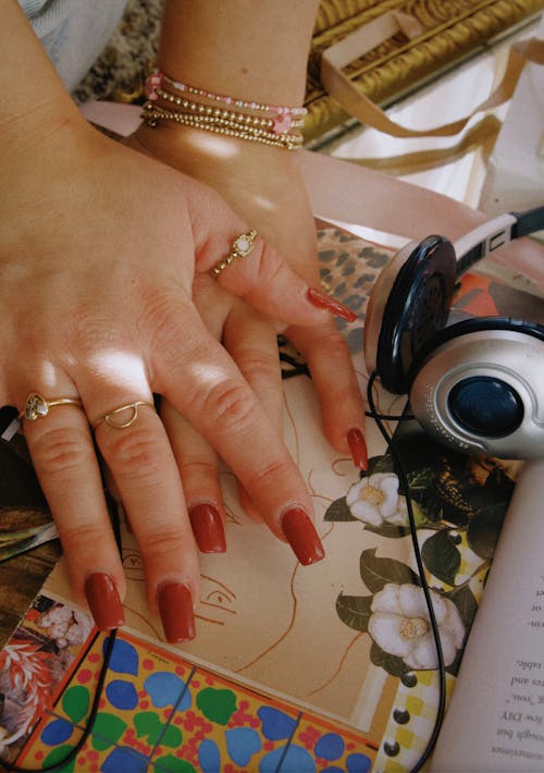 Hands with Painted Nails and Jewelry