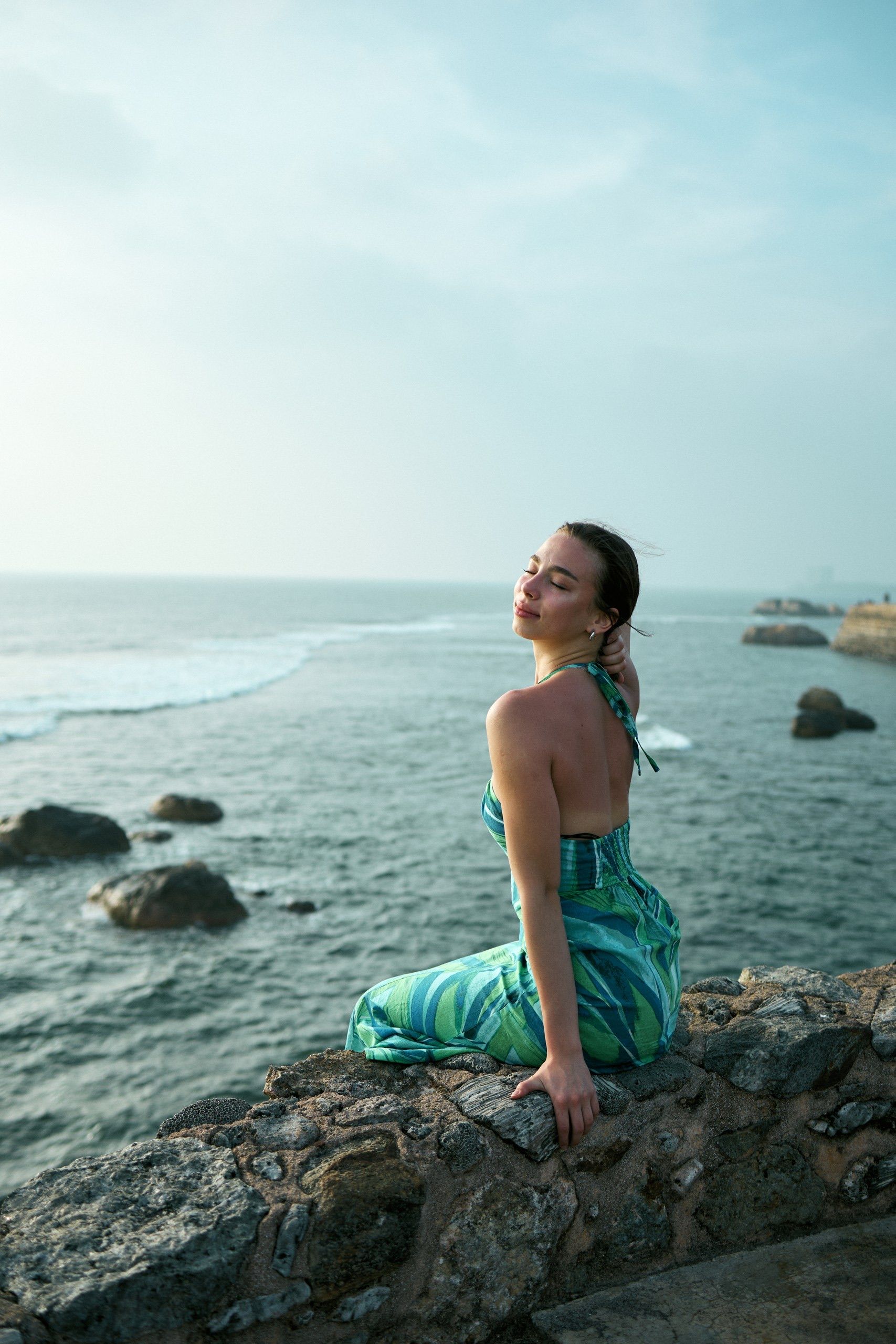 Model in Dress Posing by Sea · Free Stock Photo