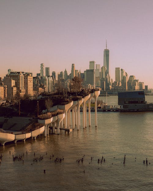 View of the Little Island, the Hudson River and Skyline of Manhattan in the Background at Sunset
