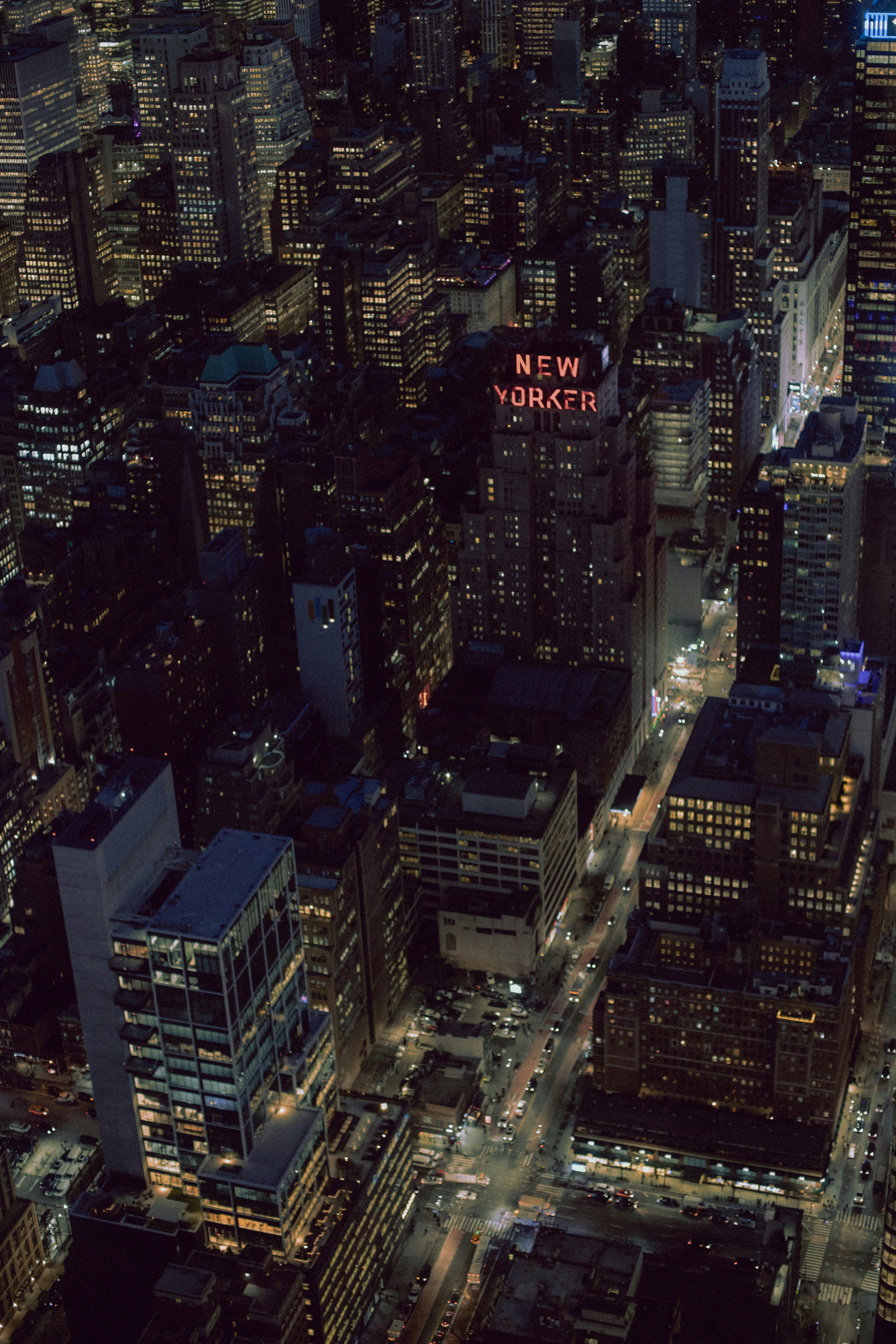 Stunning aerial photo of New York City at night showcasing skyscrapers and city lights.