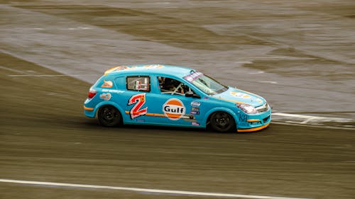 Blue Race Car on a Track 