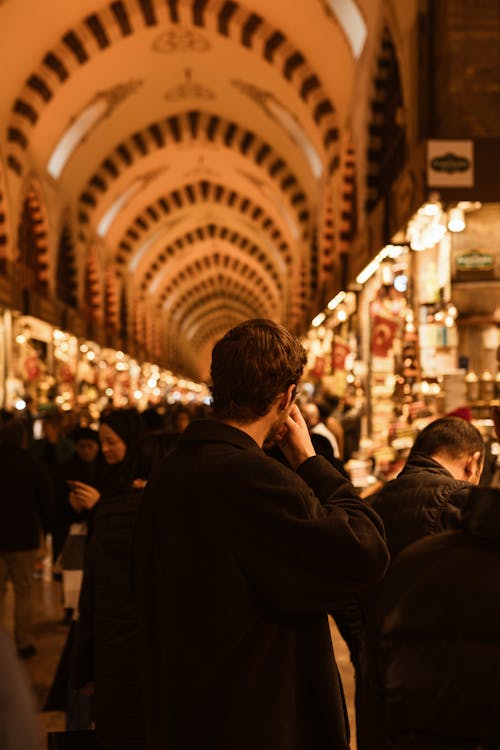 Man among People at Egyptian Bazaar