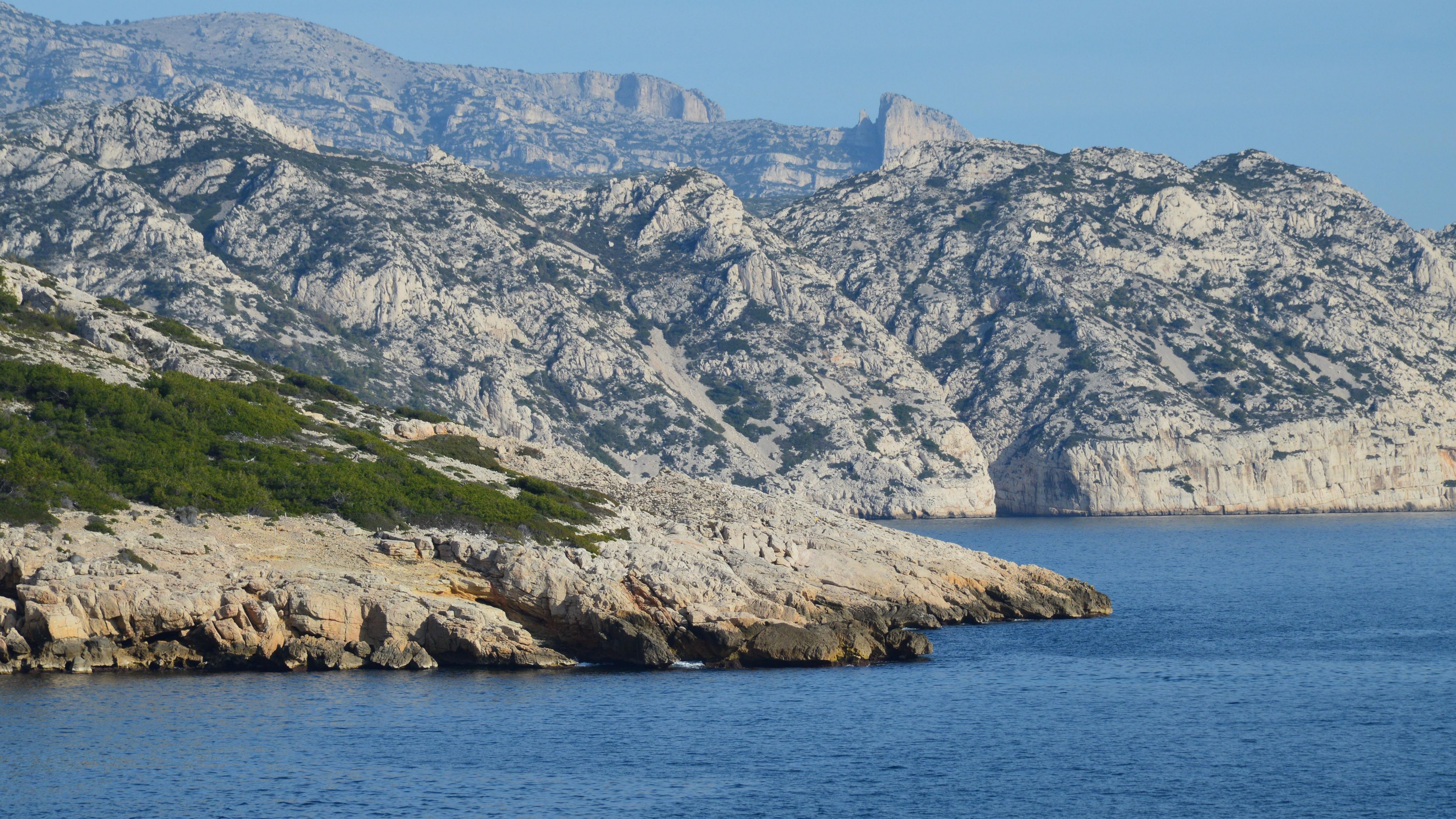 Sunny Mediterranean coast of France with clear skies, representing hot, dry summers