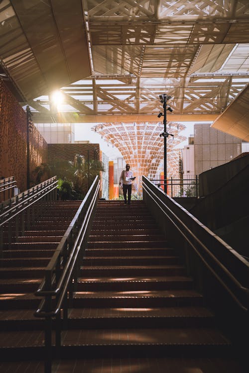 Stairs and Person Walking behind