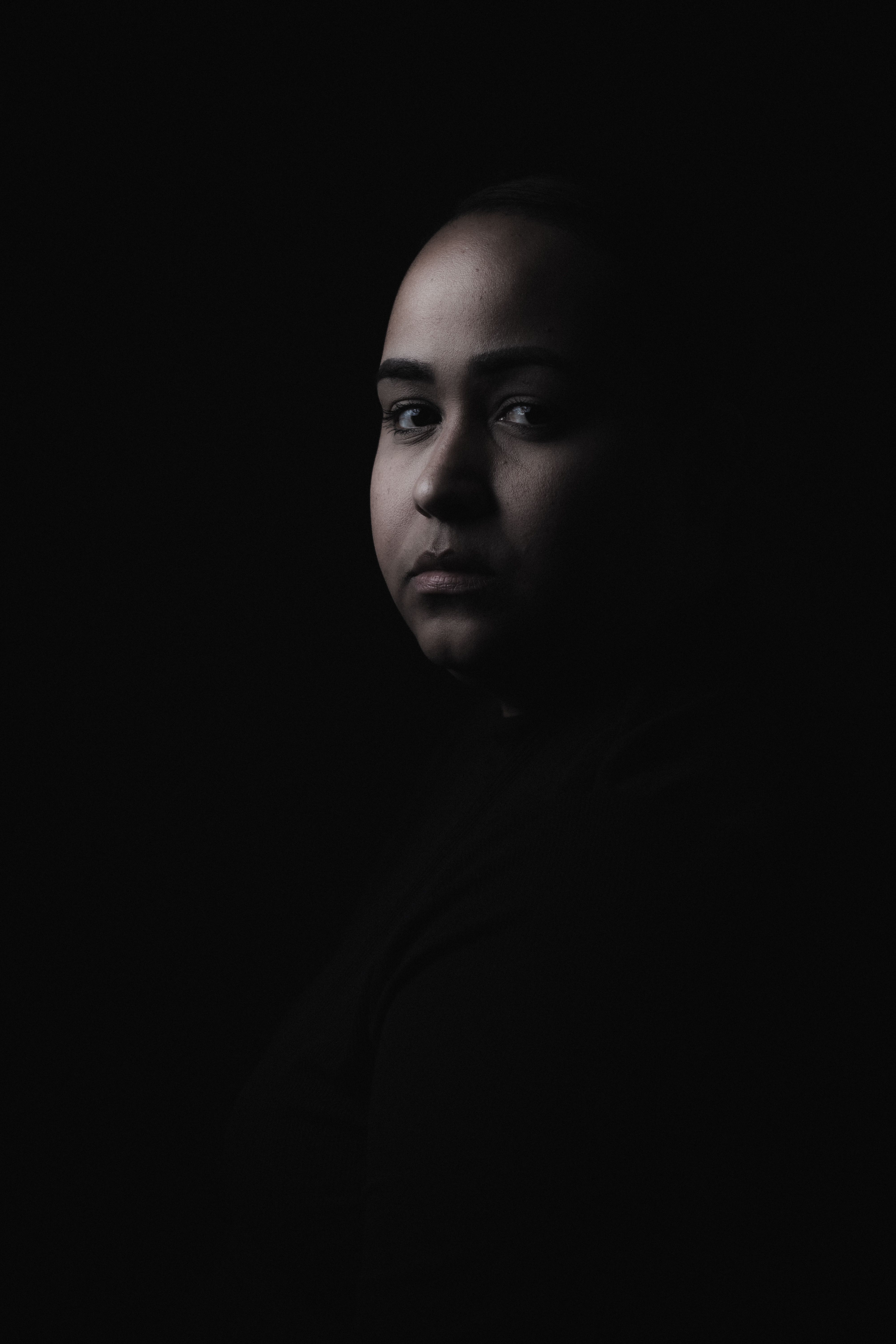 Woman Portrait in Darkness · Free Stock Photo