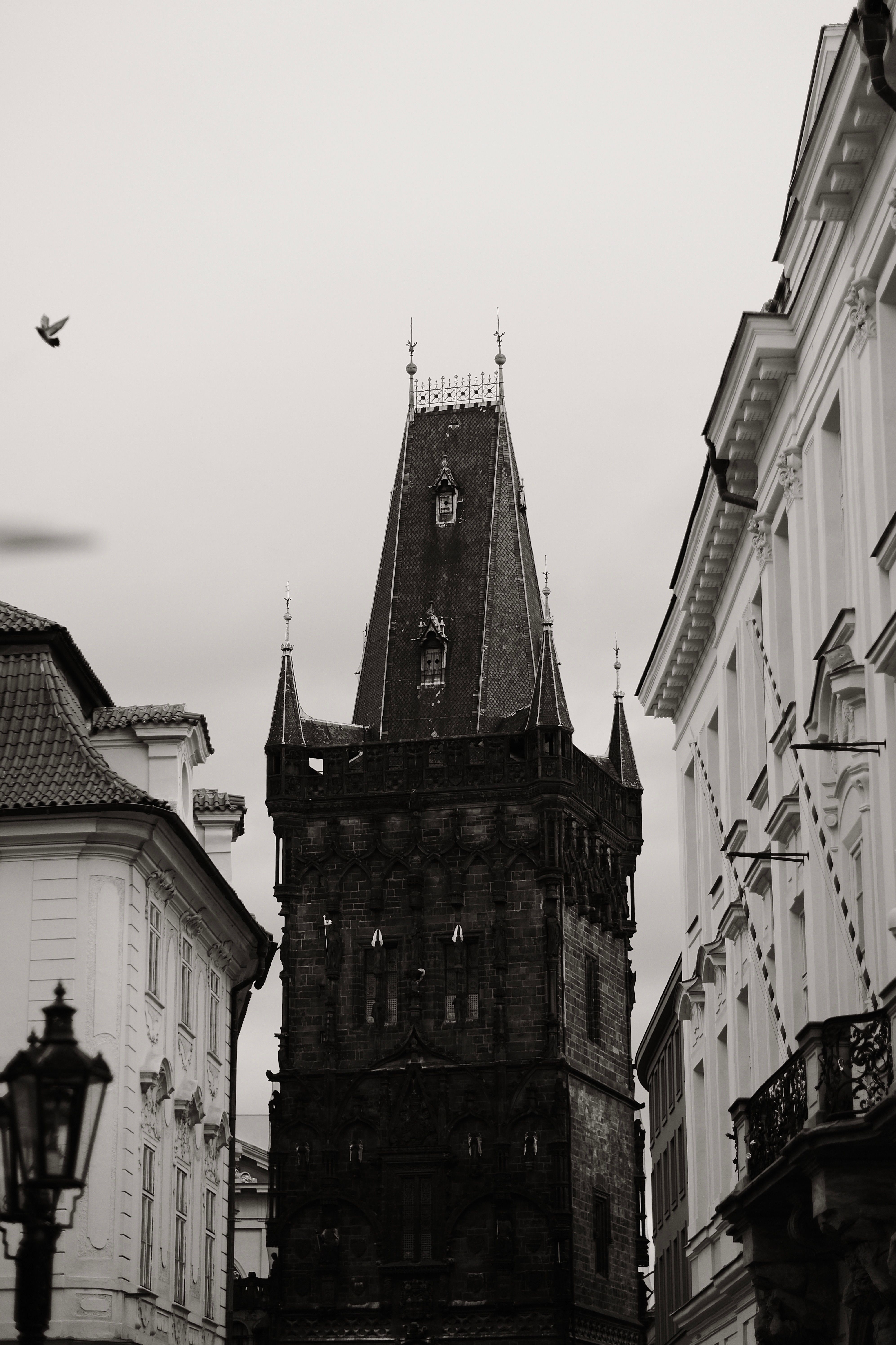 Gothic Tower in City in Black and White · Free Stock Photo