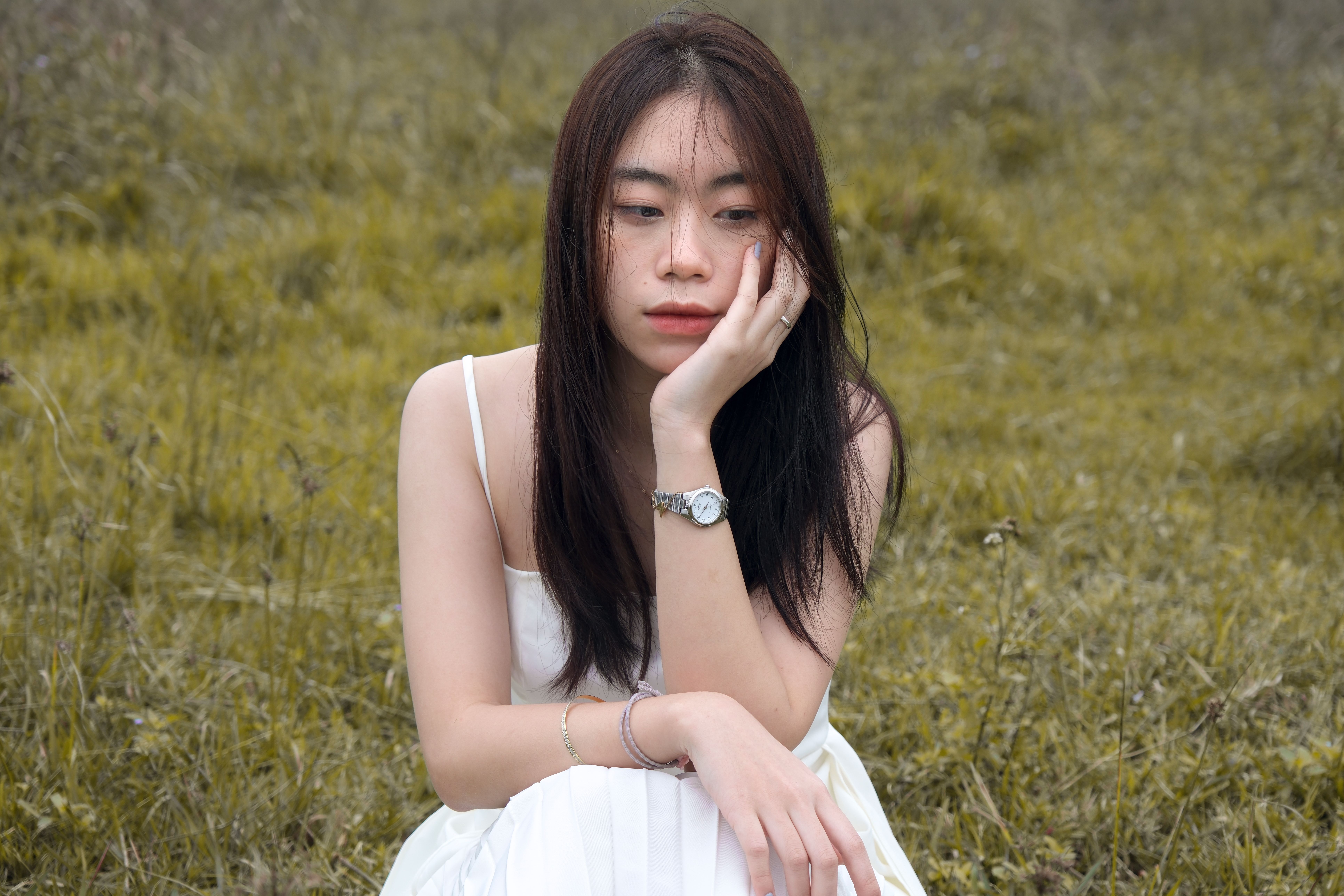 A Woman Sitting on the Ground · Free Stock Photo
