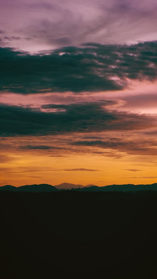 Ingyenes stockfotó arany naplemente, gyönyörű naplemente, kék hegyek témában