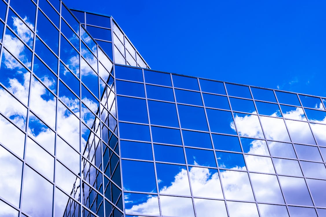 Low Angle Photo of Glass Building