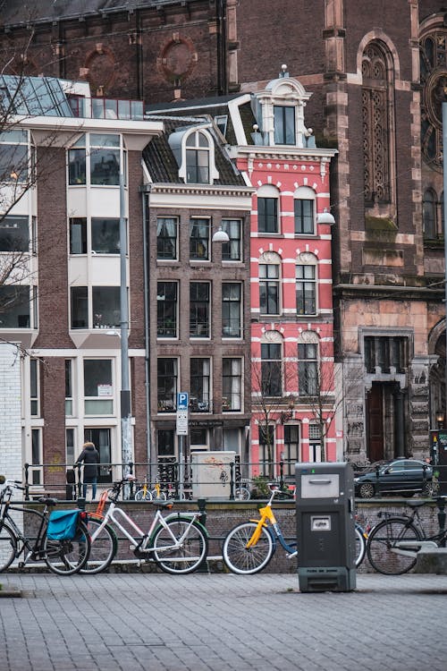 A row of bicycles parked in front of a building