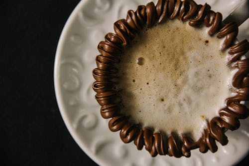 Cup of Cappuccino with Chocolate on the Rim