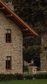 Scenic view of a stone building facade amidst lush greenery in Istanbul.