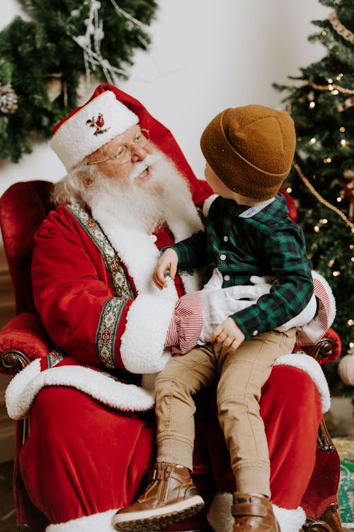 A Kid with Santa Claus