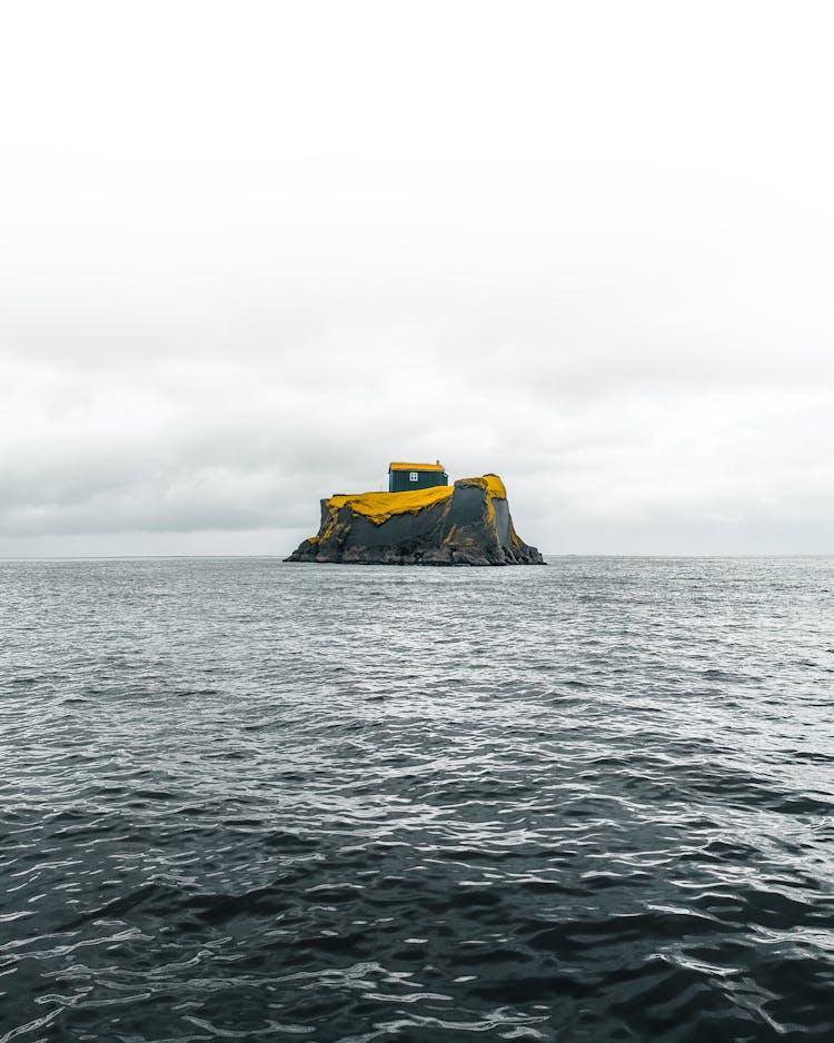 Islet With House In Sea