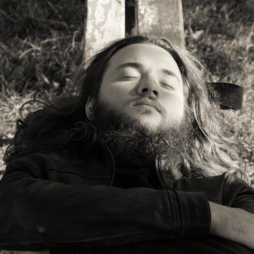 Man with Beard and Long Hair in Black and White