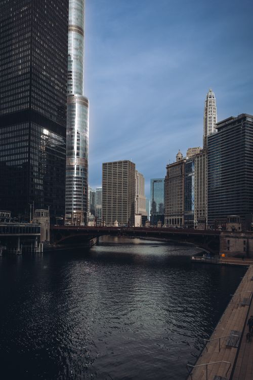 Free Dramatic view of Chicago skyscrapers alongside the river on a clear day. Stock Photo