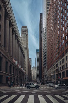 Dramatic cityscape of Chicago showcasing tall skyscrapers and bustling streets.