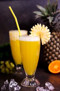 Fresh pineapple juice over ice, photo by Sanket Sawale on Pexels
