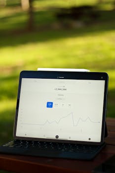 Tablet showcasing a data graph outdoors, perfect for business and technology themes.