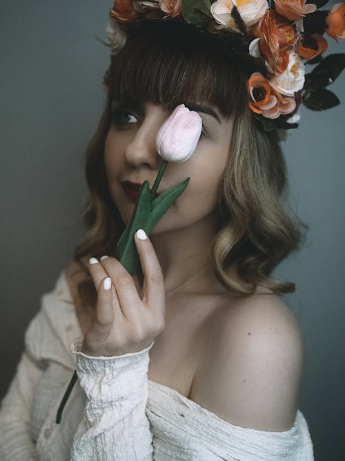 Model in Flower Headdress Holding Tulip