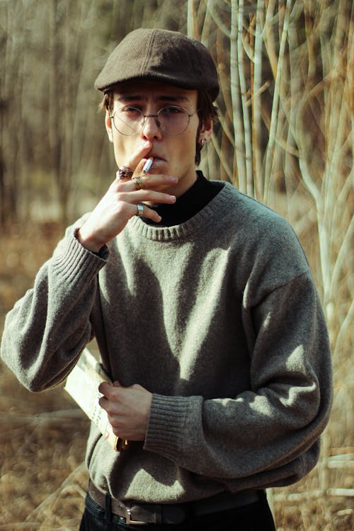 Man in Ivy Cap Smoking Cigarette