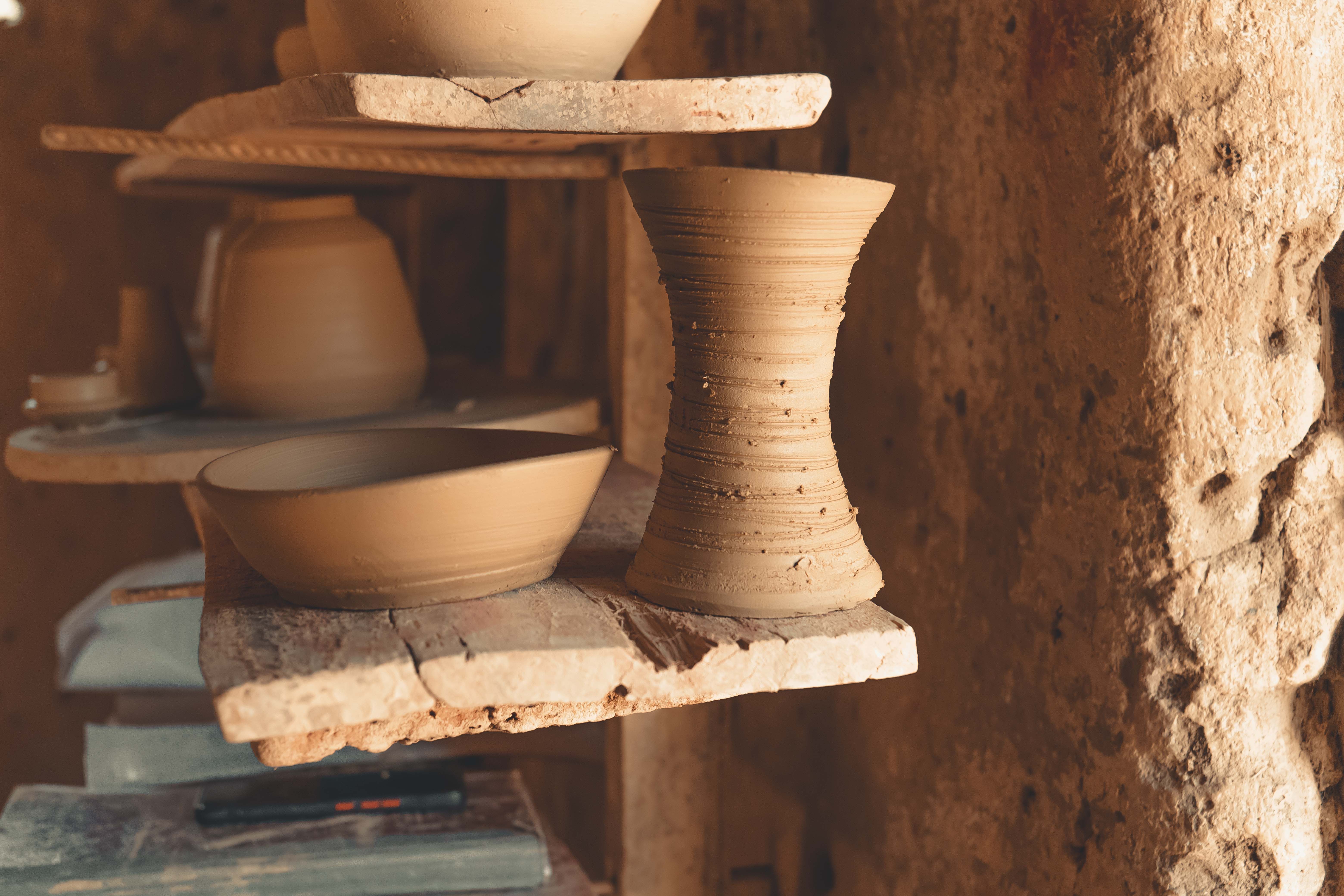 Shelves of handmade ceramic pieces