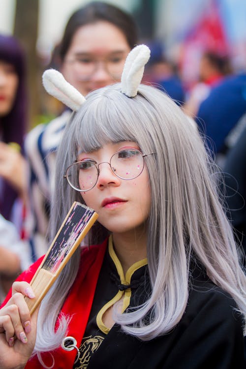 Close-Up Photo Of Girl Wearing Eyeglasses 