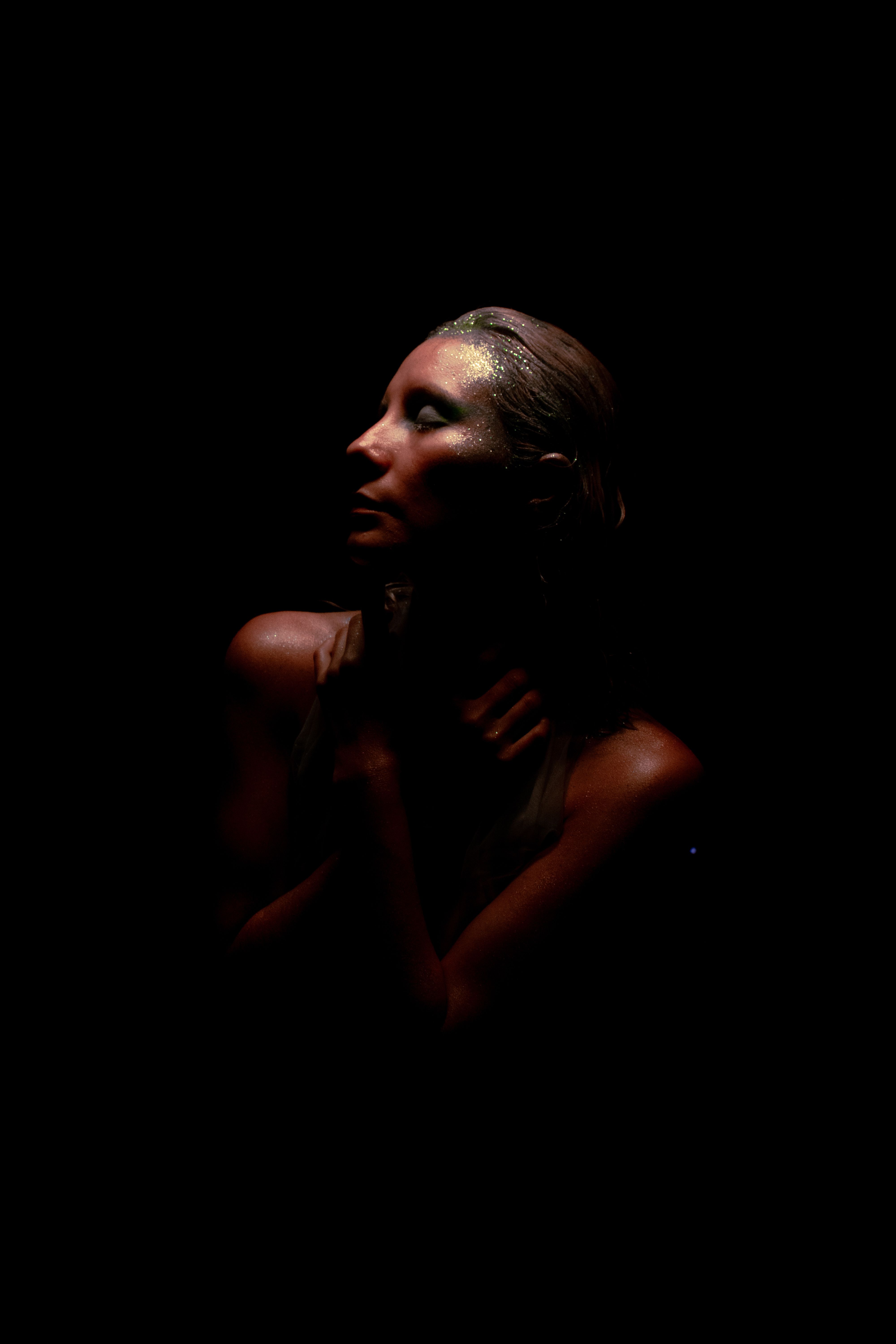Portrait of Woman in Darkness · Free Stock Photo
