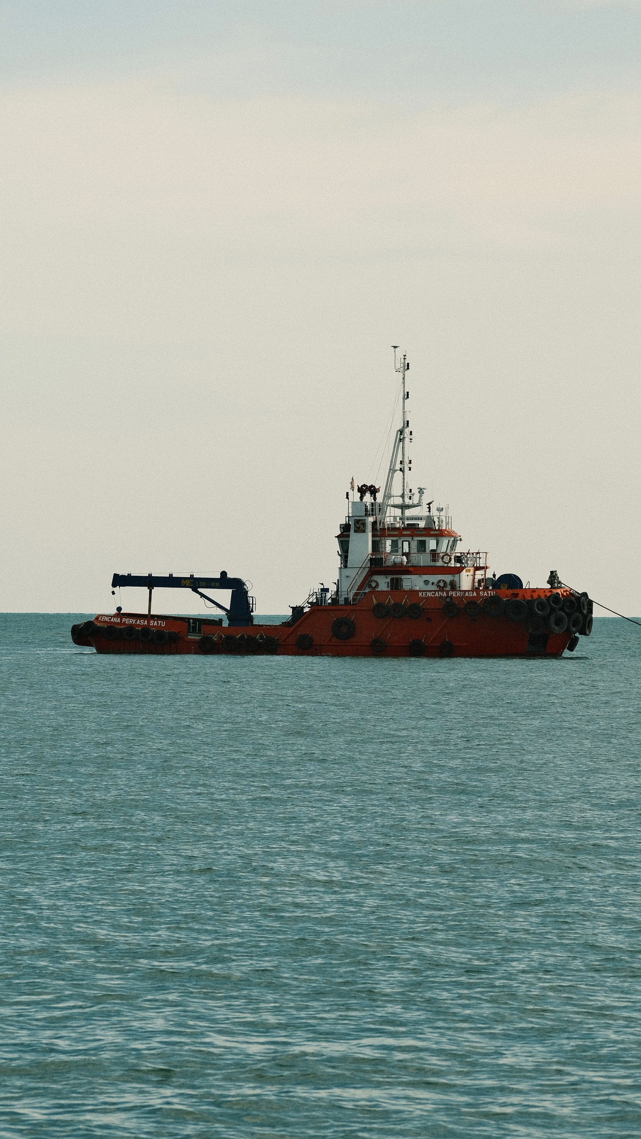 Commercial workboat underway at sea