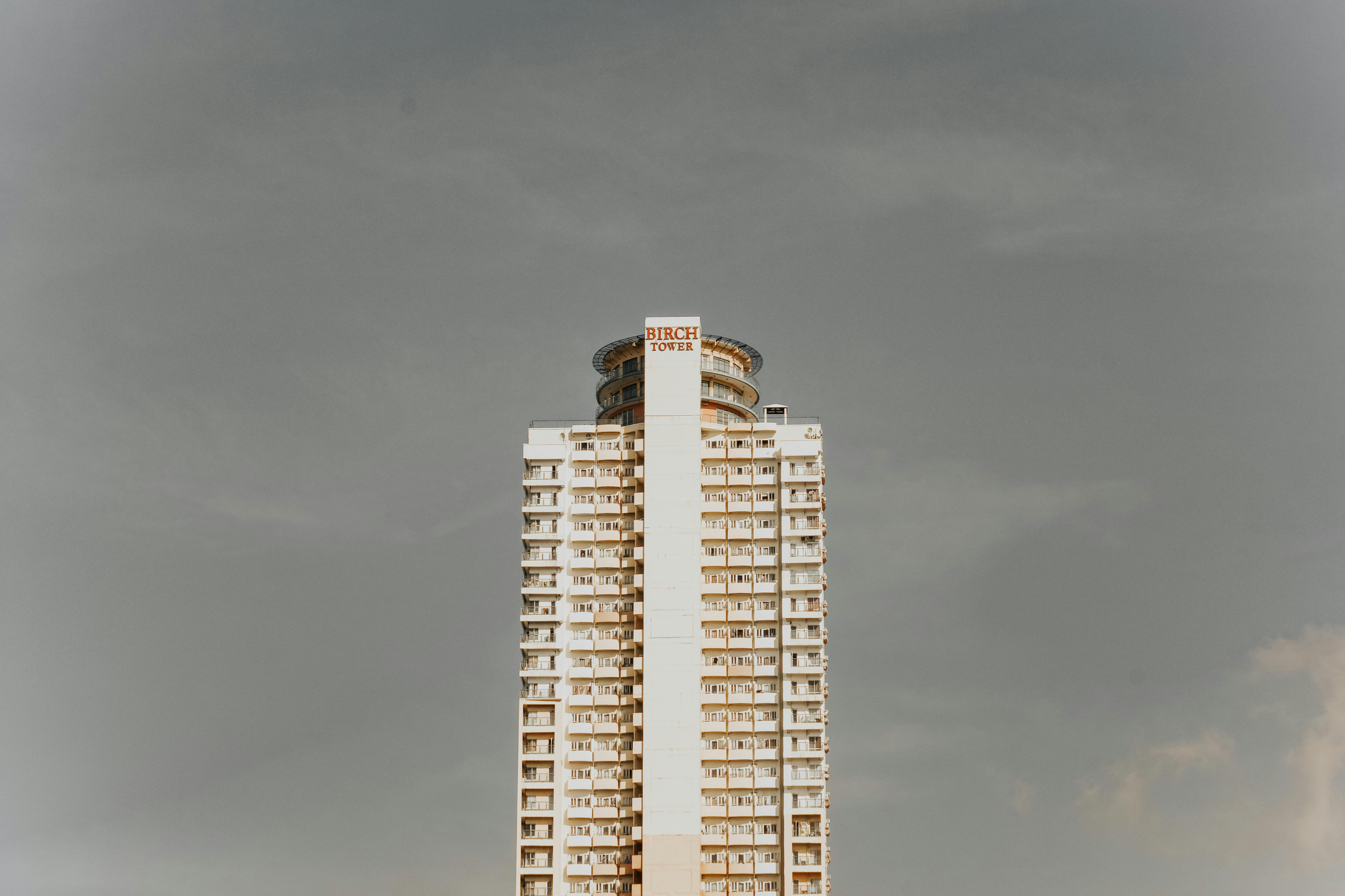 Impressive view of Birch Tower, a modern skyscraper standing tall against a clear blue sky.