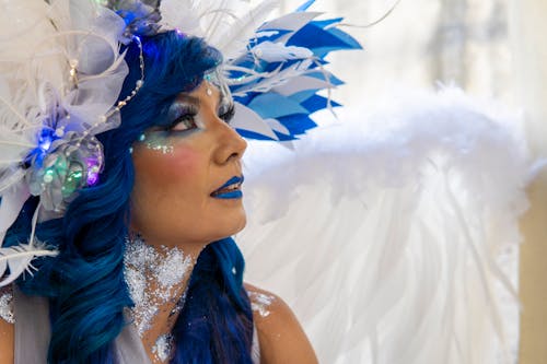 Profile of a Woman Wearing a Blue White Angel Costume