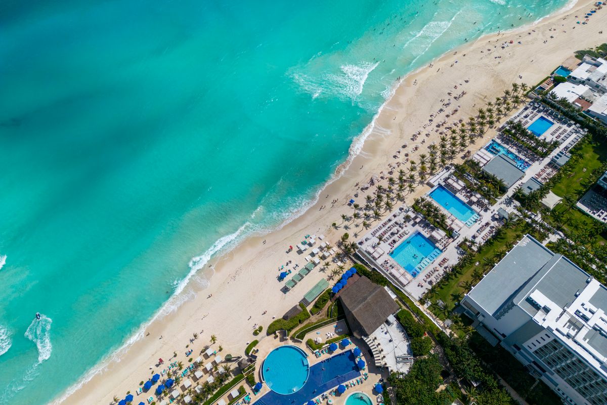 Bright blue water along the coast of Cancún, Mexico