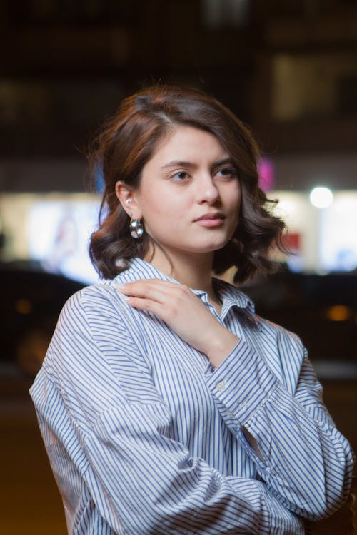 Pretty Brunette in Striped Blouse