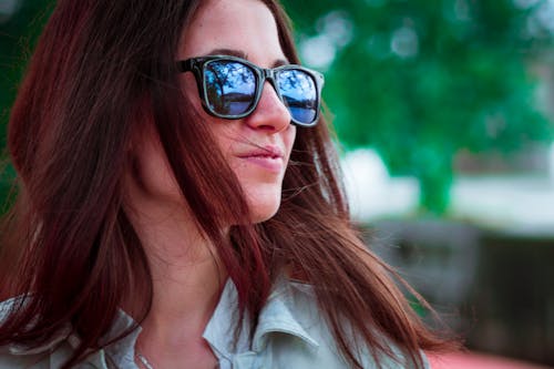 Smiling Woman Wearing Black Sunglasses