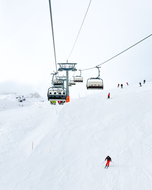 Skiers enjoy the slopes and scenic views in Lauterbrunnen, Switzerland.