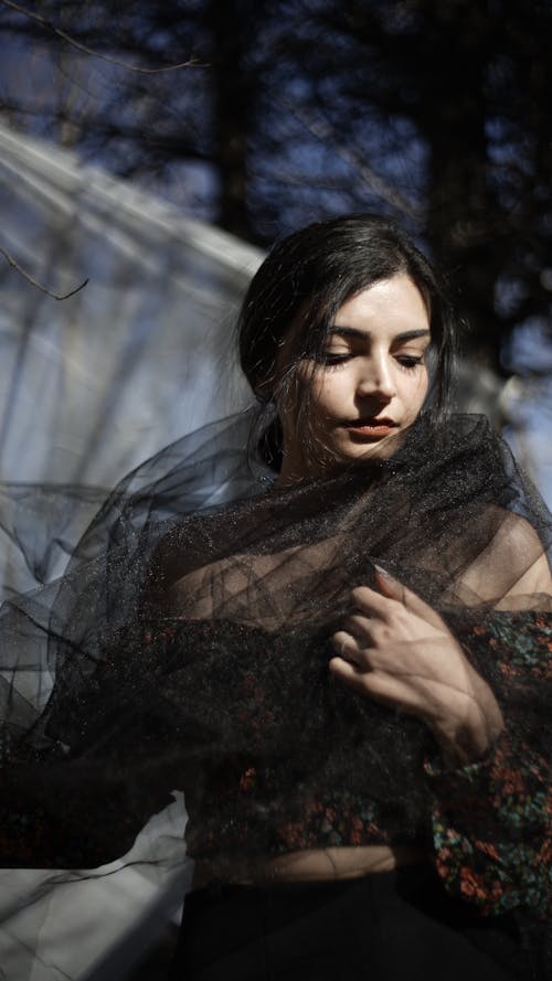 Brunette Woman Wearing Tulle Dress 