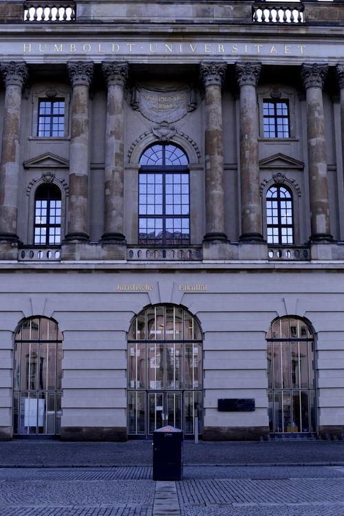 Free Front view of Humboldt University Law Faculty in Berlin showcasing its classical architecture. Stock Photo