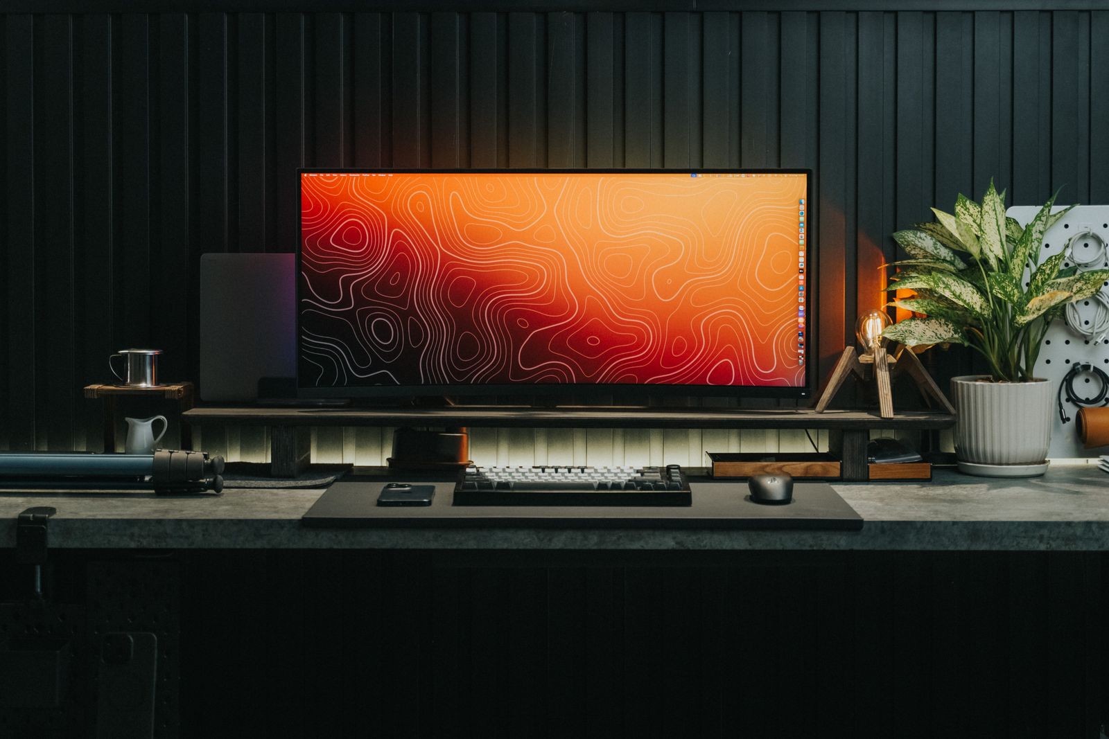 Organized gaming monitor, keyboard and mouse on a modern desk