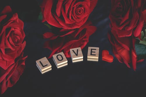 Love letters with red roses