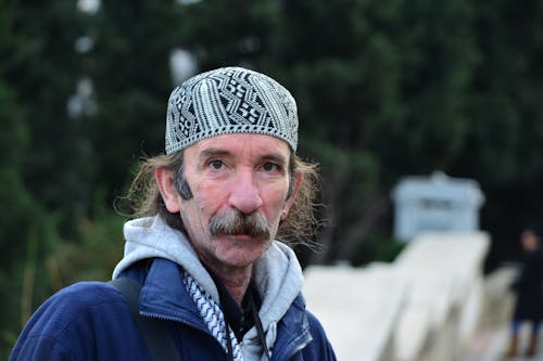 Portrait of Man in Hat and with Moustache