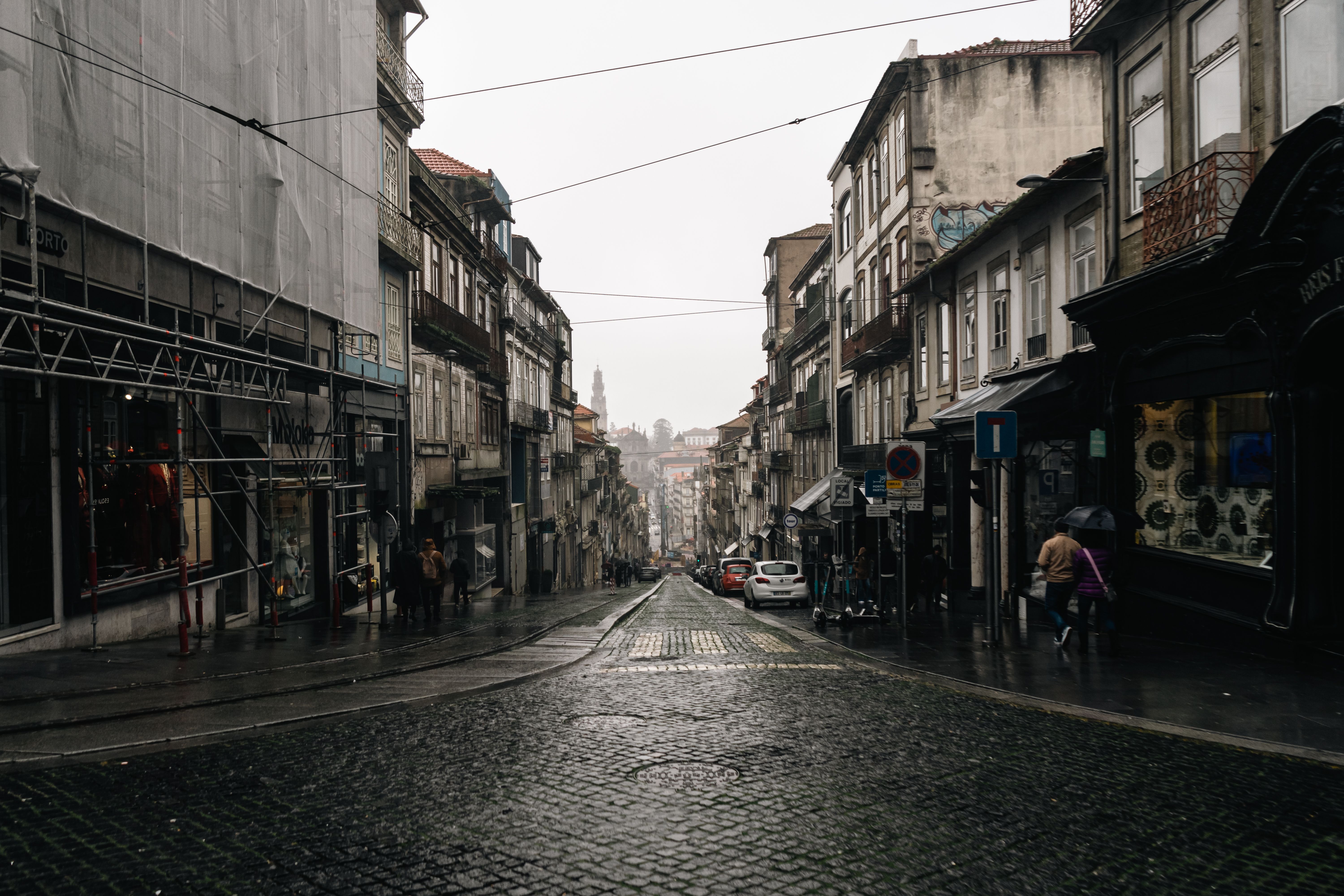 Old European cobblestone street on a rainy day