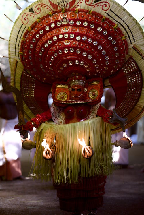 A Dancer in a Costume at a Religious Festival 