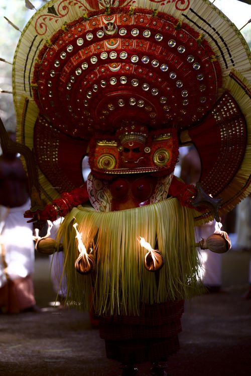 Free Traditional Kerala ritual dance with elaborate costume and headdress, showcasing cultural heritage. Stock Photo