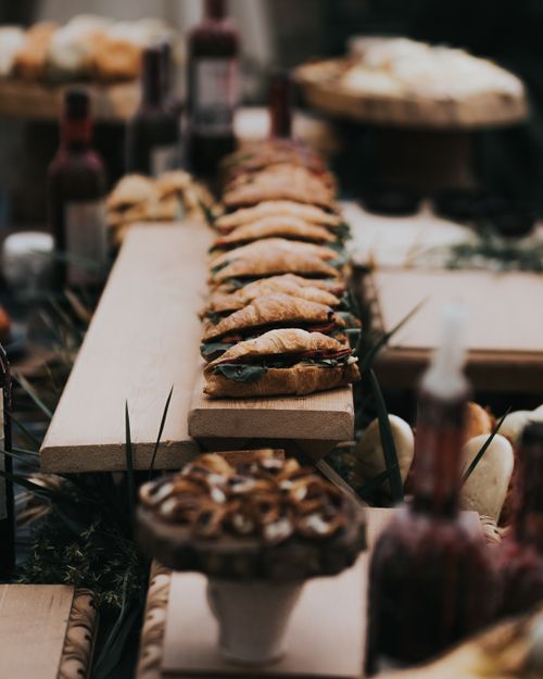 Free Appetizing croissants arranged on a wooden board with blurred background in Antalya, Türkiye. Stock Photo