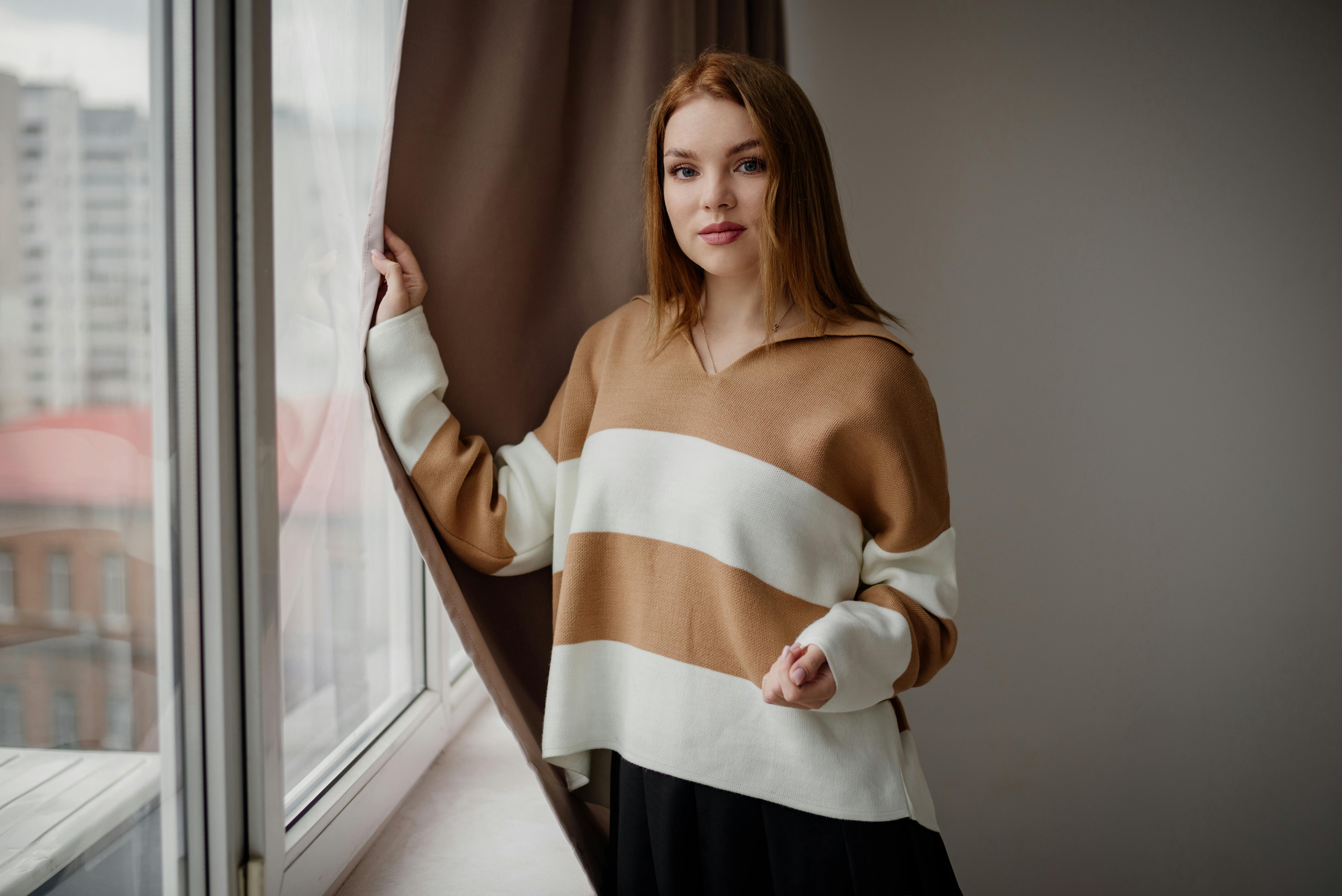 redhead model in sweater