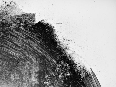 Abstract black and white texture with dynamic brush strokes and contrast, ideal for backgrounds.