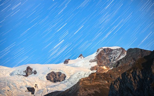 Lights on Clear Sky over Mountain