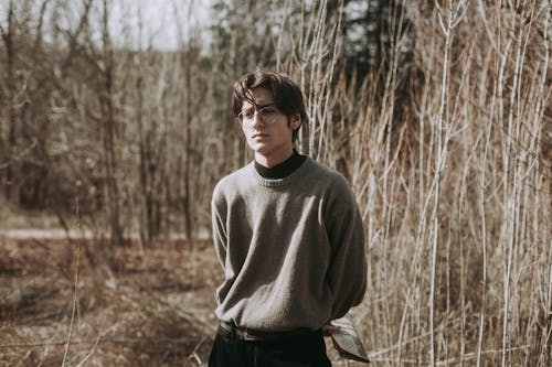 Portrait of Standing Man in Sweater 
