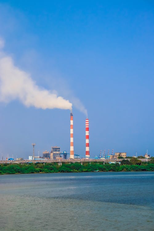 Kostnadsfri bild av byggnader, fabrik, förorening