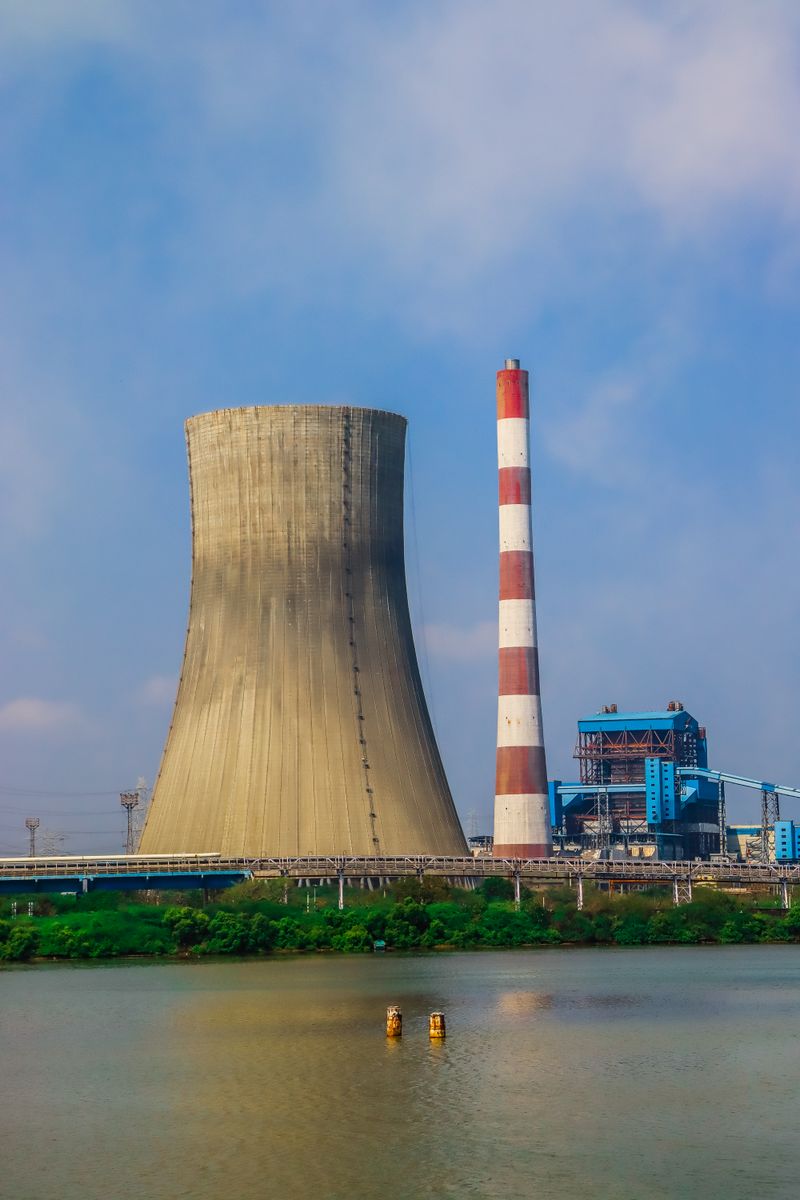 A large industrial power plant with cooling tower